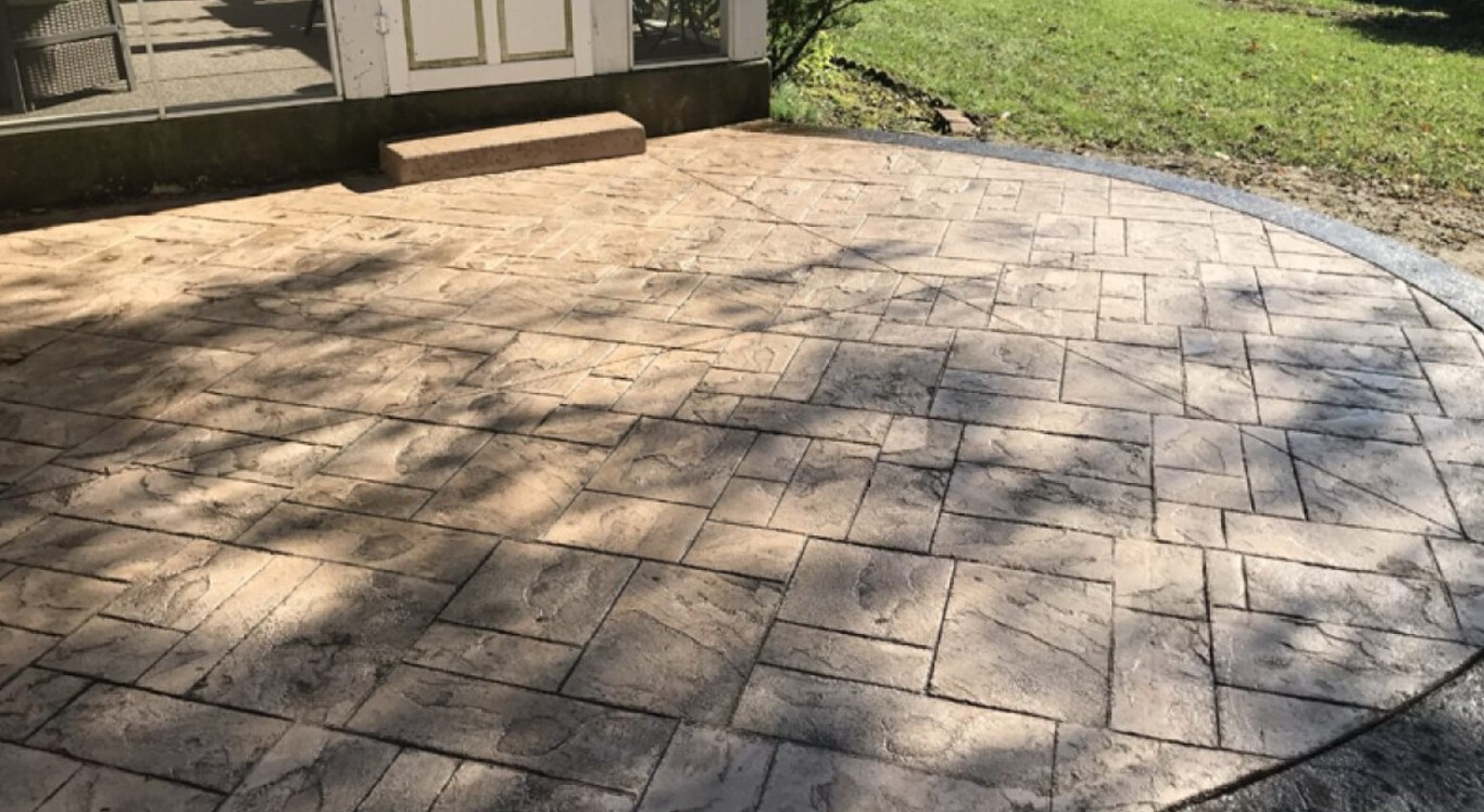 Beautiful stamped concrete patio with decorative pattern in Merrimack, NH