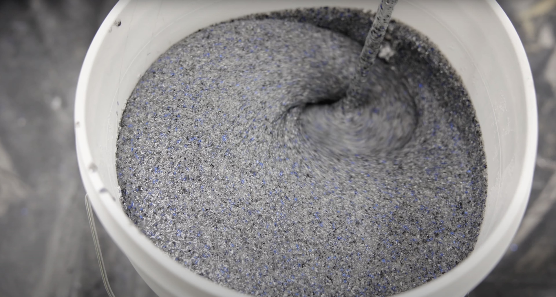 Professional concrete mixing process showing quality materials preparation
