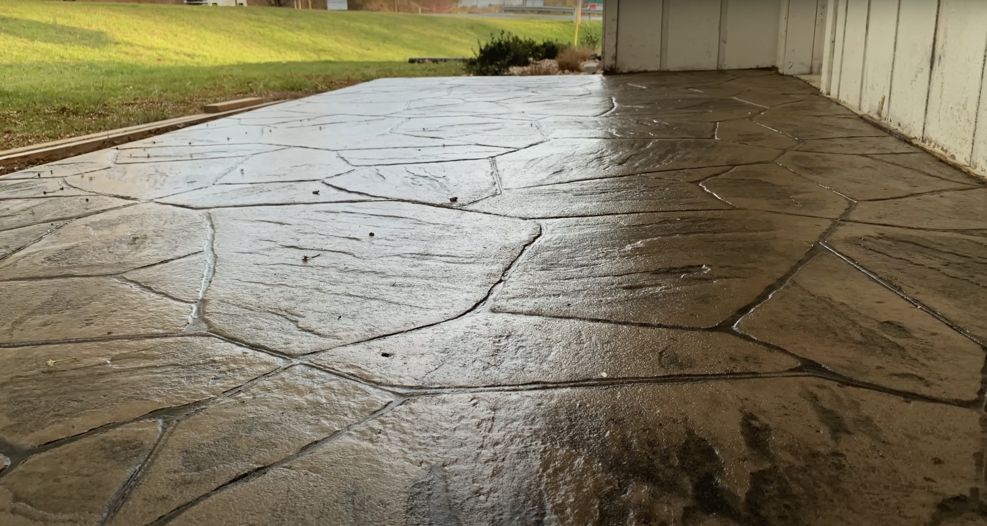 Finished stamped concrete patio with decorative pattern showing professional craftsmanship