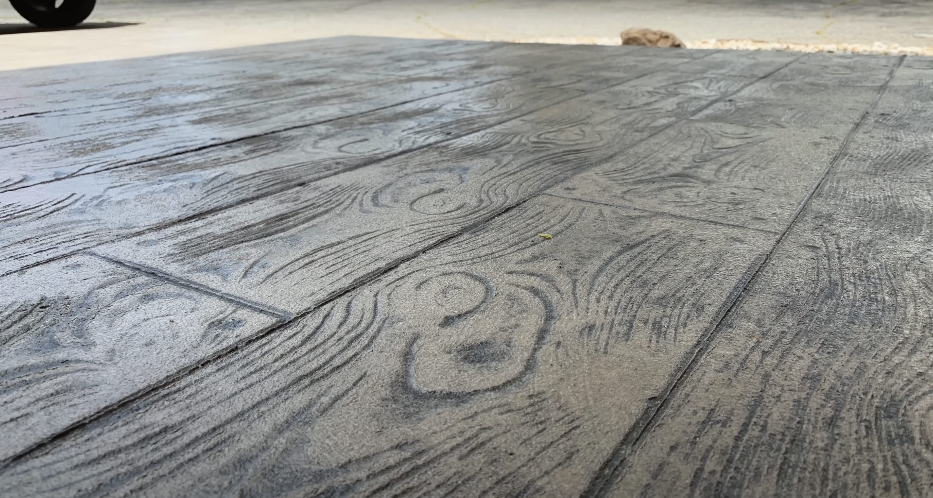 Beautiful wood-grain stamped concrete surface showing decorative concrete expertise